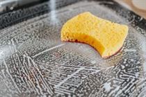 A sponge cleaning a surface